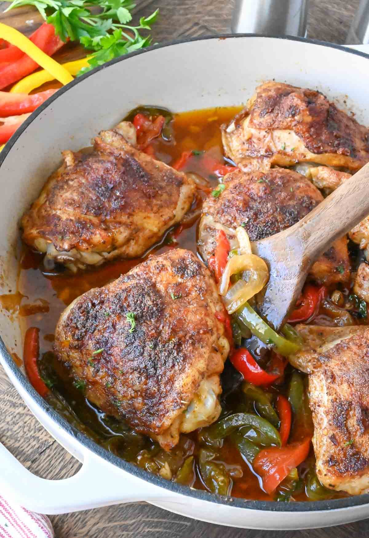 A pan of baked cajun chicken thighs.
