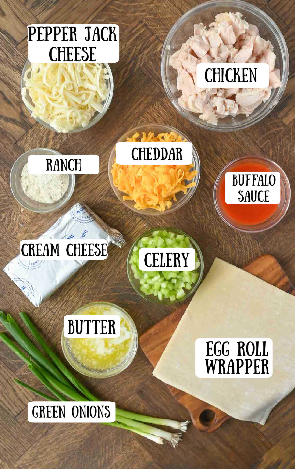 Labeled ingredients for buffalo chicken egg rolls.