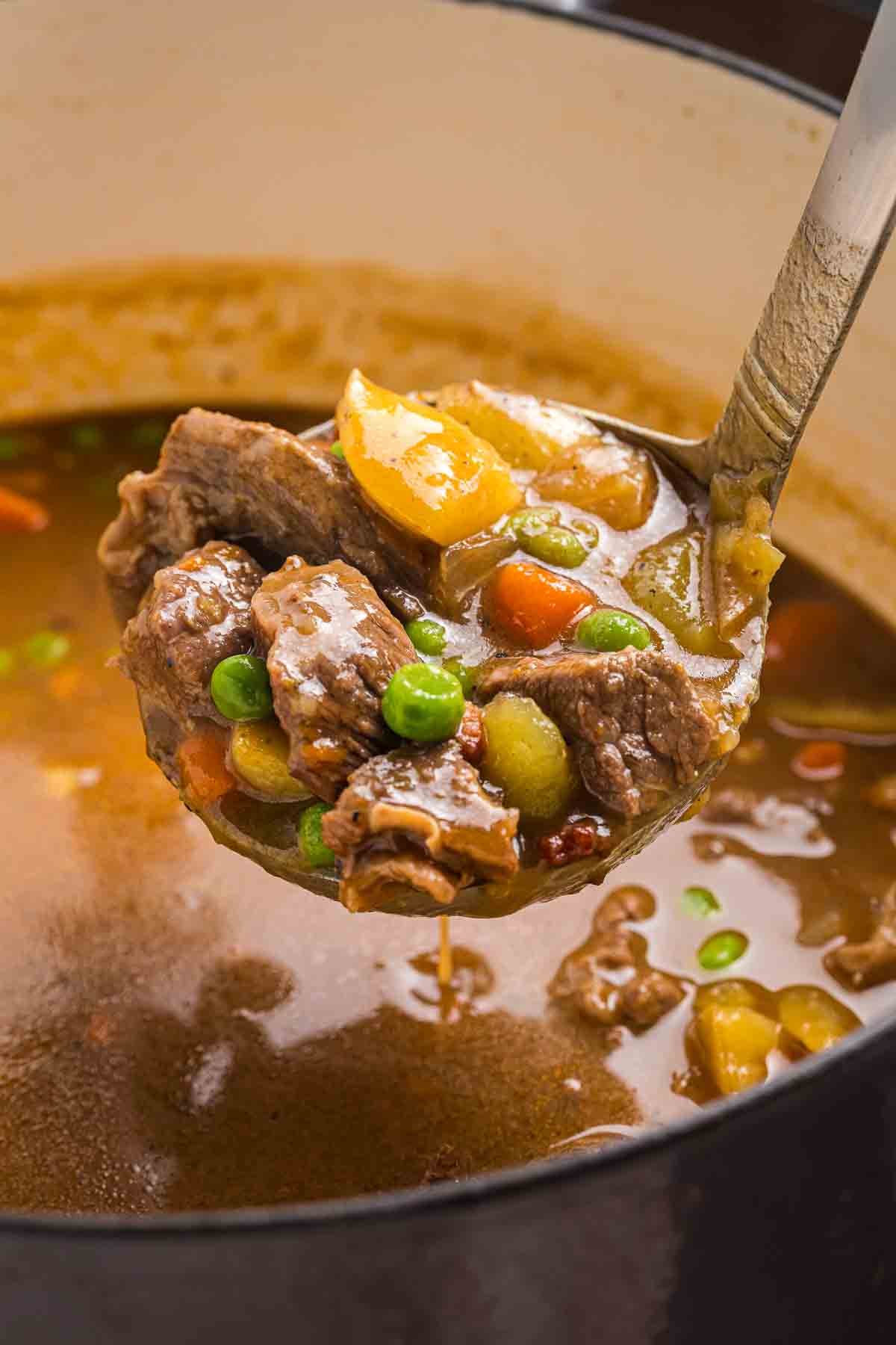 Taking a big spoonful of beef and guinness stew.