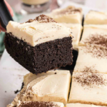 Close up of a slice of guinness chocolate cake.