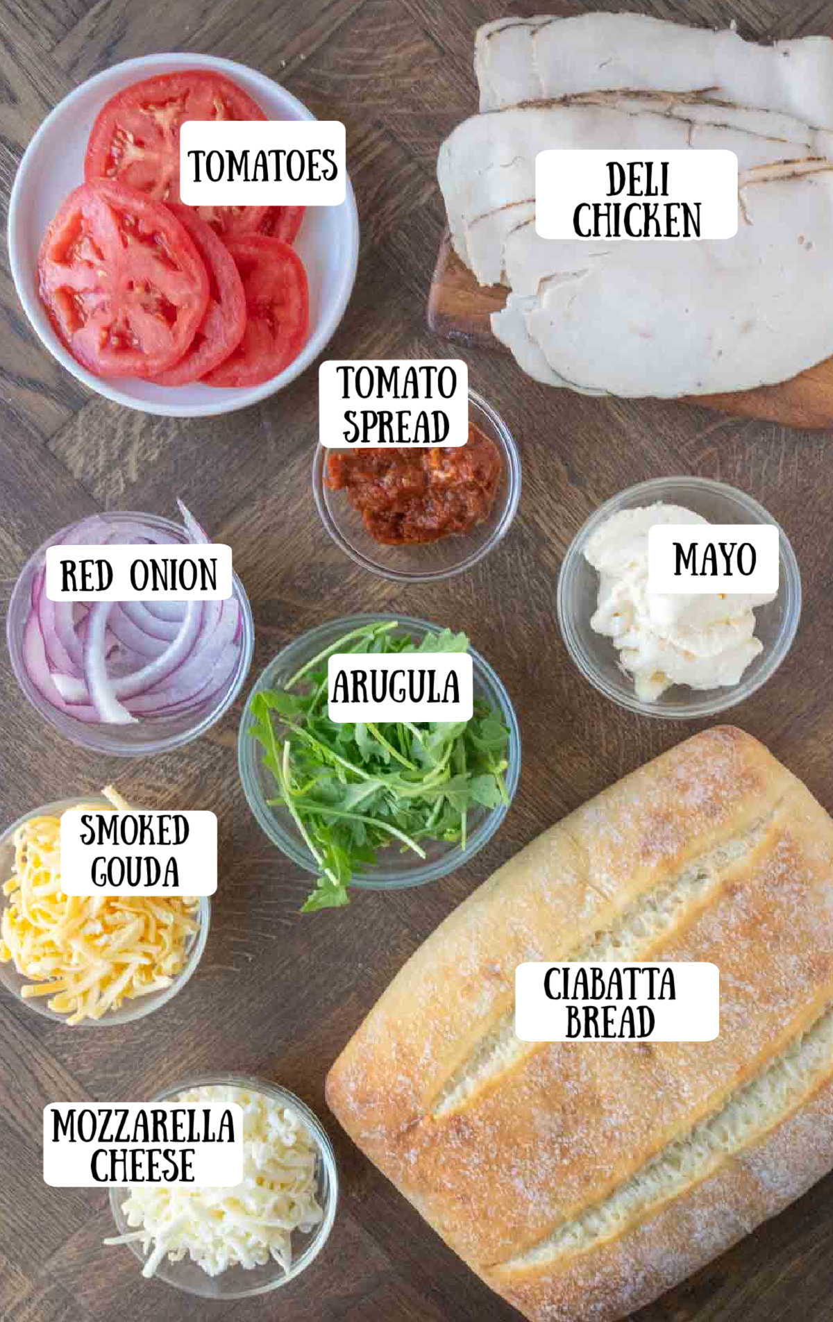 Labeled ingredients for making a chicken ciabatta sandwich.