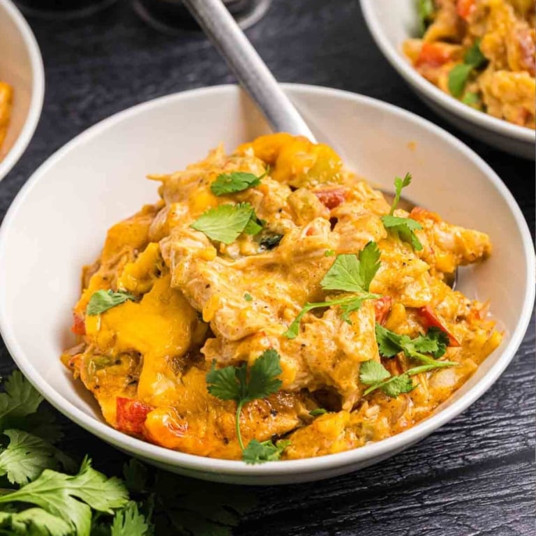 Close up view of a bowl of king ranch chicken casserole recipe.