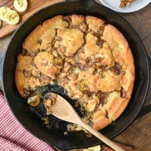 Old fashioned banana cobbler in a cast iron skillet.