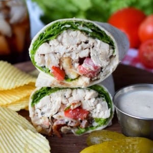 Chicken caesar salad wrap cut in half.