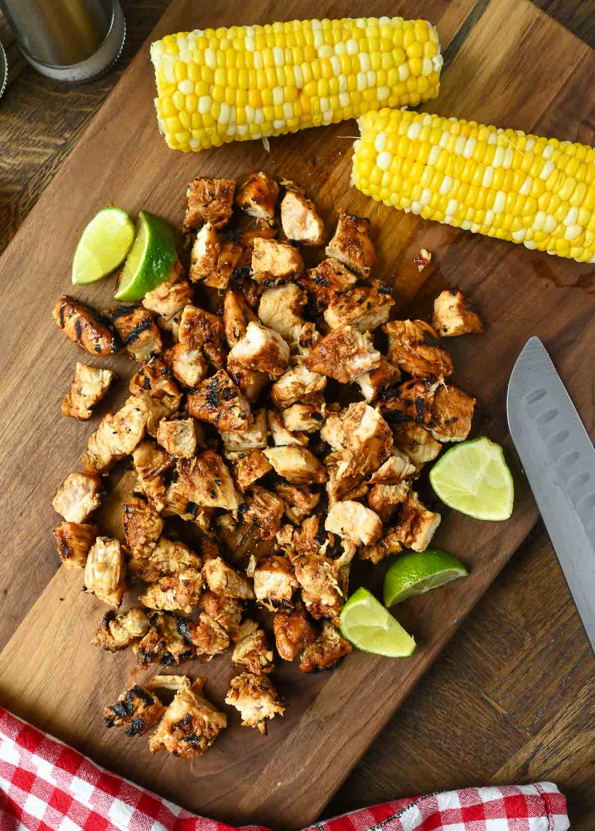 Chopped up copycat chipotle honey chicken on a cutting board.