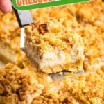 A spatula picking up an apple cheesecake bar PIN.