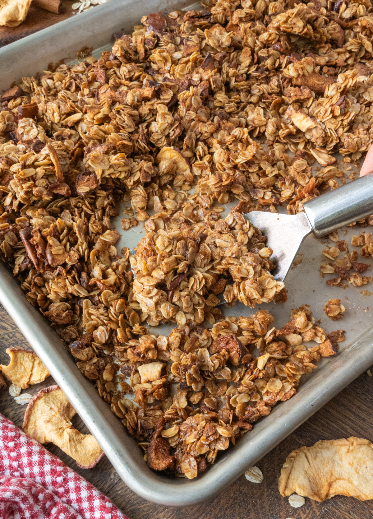 Baked apple pie granola on a baking sheet.