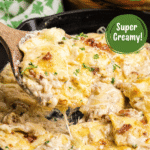 Olive Garden Ravioli Carbonara in a skillet with a wooden spoon pinterest pin.