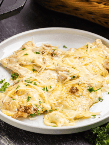 Olive Garden Ravioli Carbonara pasta on a white plate.